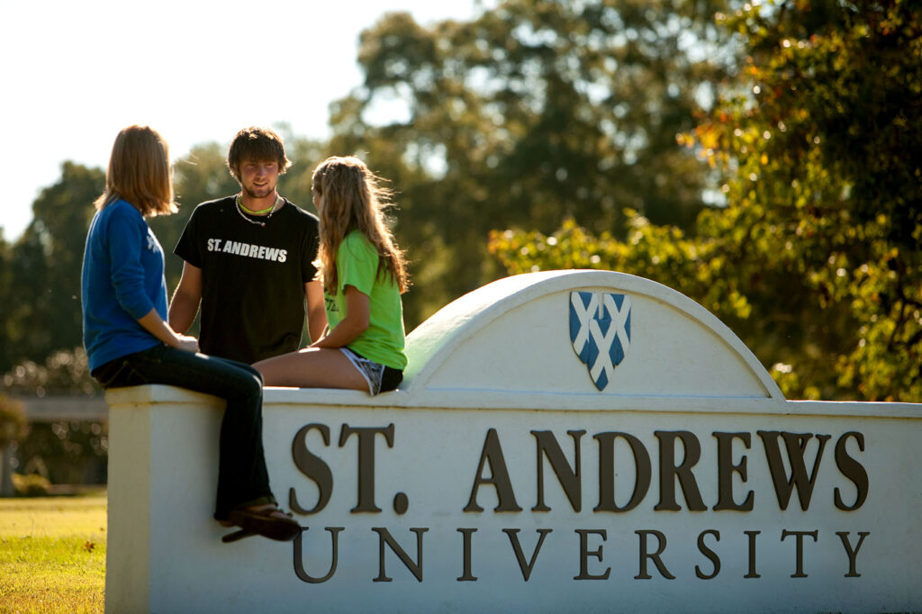 st andrews students near sign